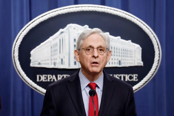 U.S. Attorney General Merrick Garland speaking at a news co<em></em>nference in the Department of Justice Building
