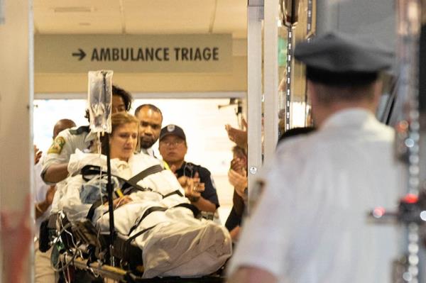 Julia Fatum getting rushed into the hospital on a gurney after the July 19 stabbing