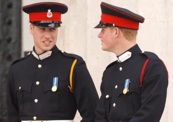 Prince William and Prince Harry smile at the passing-out Sovereign's Parade at Sandhurst Military Academy.