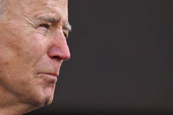 US President-Elect Joe Biden is tearful as he speaks at Major Joseph R. 