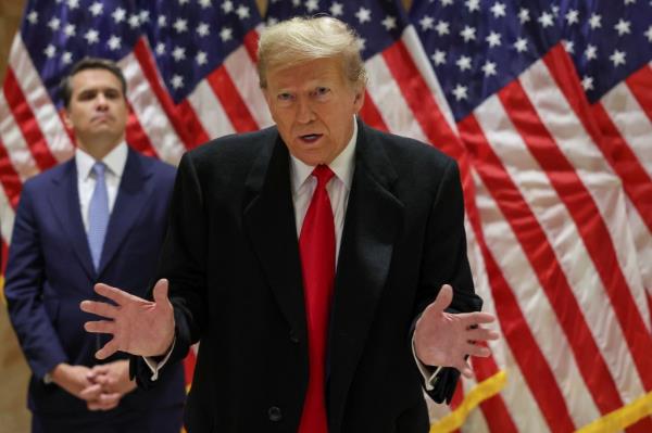 Do<em></em>nald Trump speaks during a press co<em></em>nference at one of his properties after attending a hearing in his criminal court case.