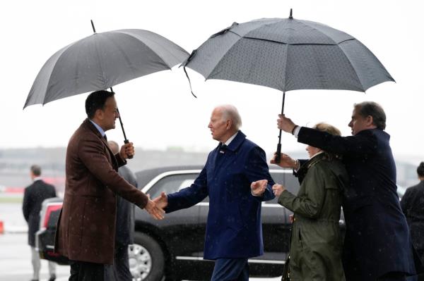 President Joe Biden shakes hands with Ireland's Taoiseach Leo Varadkar.