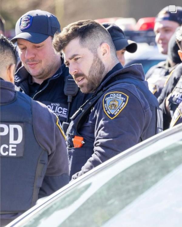 NYPD Officer Jo<em></em>nathan Diller standing with fellow police officers in an undated photo
