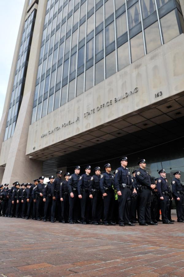 Police recruits lined up outside the Adam Clayton Powell, Jr. State Office Building in Harlem during the NYPD Multicultural Immersion training course kick-off