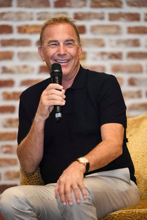 Kevin Costner speaking at the Venice Film Festival. 