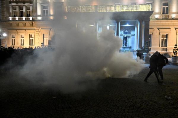 Anti-riot police units use tear gas to disperse protesters near the Belgrade's city council building during a demo<em></em>nstration in Belgrade, on December 24, 2023, a week after the parliamentary and local elections in Serbia. Serbia announced plans on December 20, to rerun elections in 30 polling locations