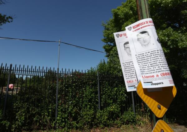 NYPD flyer taped on a telephone pole with sketch of and request for information a<em></em>bout the man who raped a 13-year-old girl in Kissena Park
