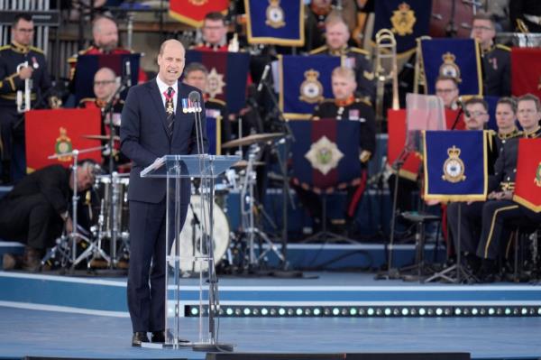 Prince William at a podium giving a reading during the 80th anniversary D-Day commemoration event in Portsmouth, Hampshire, Britain