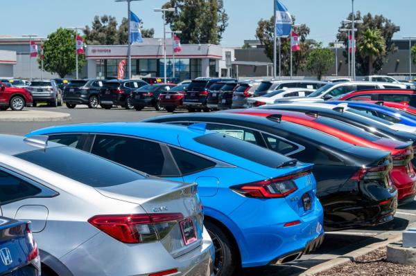 Vehicles for sale at a car dealership in California.