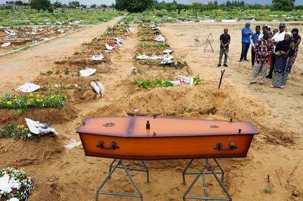 A coffin with the body of Hilario Benjamin Dima, who died during clashes between police and protesters at last week's 
