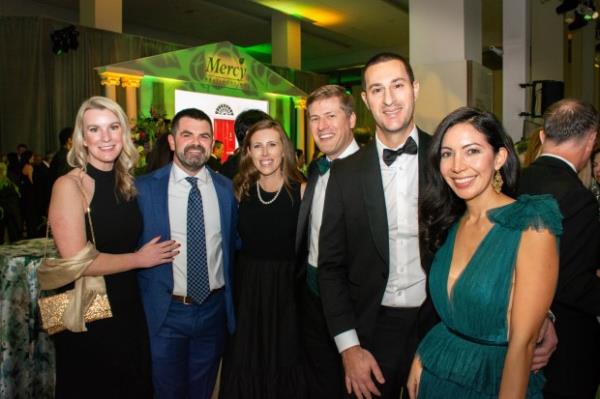 From left - Meghan Schultz, Johns Hopkins University nurse manager, Phil Beatson, Mercy Health Services senior vice president of strategy and operations, Dr. Lesley Sutherland, Dockside Dermatology dermatologist, Dr. Clayton Alexander, MHS hand surgeon, Dr. Gregory Gasbarro, MHS shoulder surgeon, and Dr. Christina Gasbarro, MHS primary care physician, at the Mercy Medical Center 150th Anniversary Gratitude Gala. (Sloane Brown)