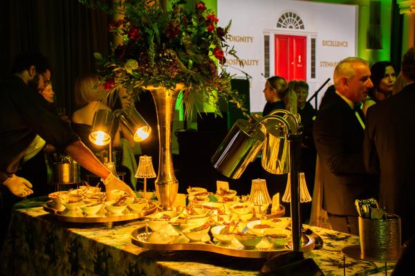 Guests had their choice of appetizers, drinks, and people to mingle with during the Gratitude Gala's cocktail hour in the done-over Bunting Center lobby. (Sloane Brown)
