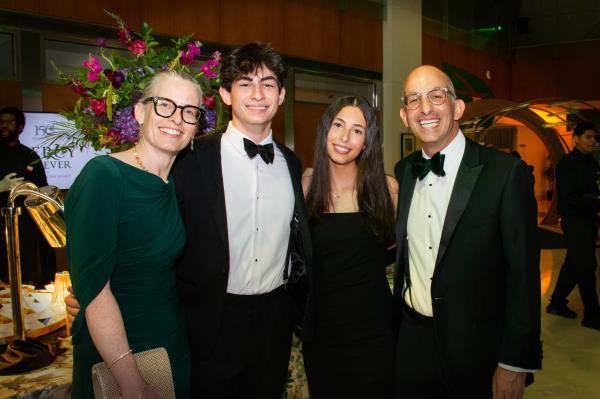 From left - Dr. Rachelle Smith-Maine, East Baltimore Medical Center doctor of internal medicine and pediatrics, Zachary Maine, student, Naomi Maine, student, and Dr. David Maine, Mercy Health Services president/CEO, at the Mercy Medical Center 150th Anniversary Gratitude Gala. (Sloane Brown)