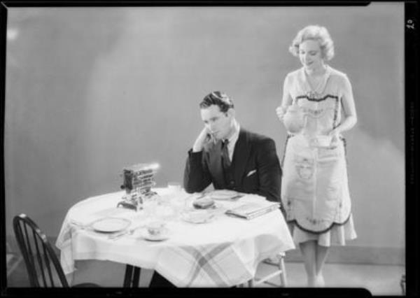 An advertising image from the 1930s. It seems that the man is not happy with the coffee he has been served.