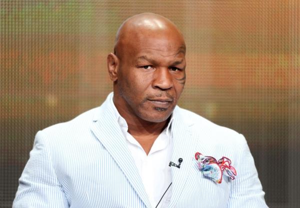 美国拳王泰森(Mike Tyson)的律师说，他不会向在飞机上被拳击赛的男子支付45万美元的“勒索费”