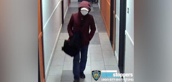 Both are seen wearing white face masks, and one had on a maroon hoodie and the other a black hoodie. 