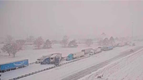 Nebraska Department of Transportation camera showed jackknifed semis completely blocking traffic with dozens of vehicles piled up on the highway. Photo: Hindustan Times</p>
<p>