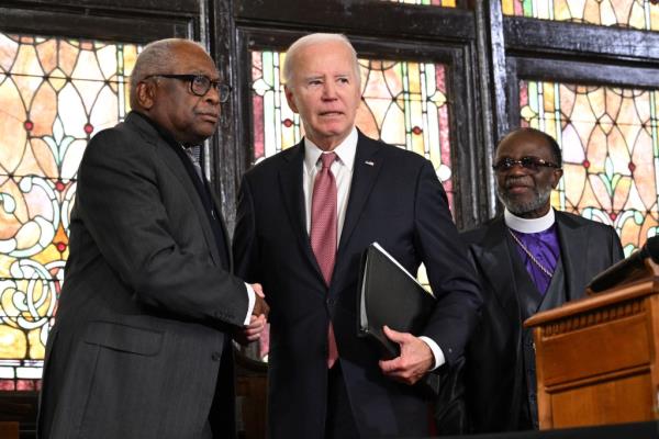 Biden shaking hands with Rep. Jim Clyburn after speaking at Mother Emanuel AME church.