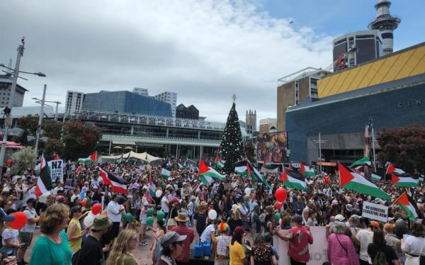 Crowds co<em></em>nverge on Auckland's Aotea Square for a 'All Out For Palestine' march Sunday.