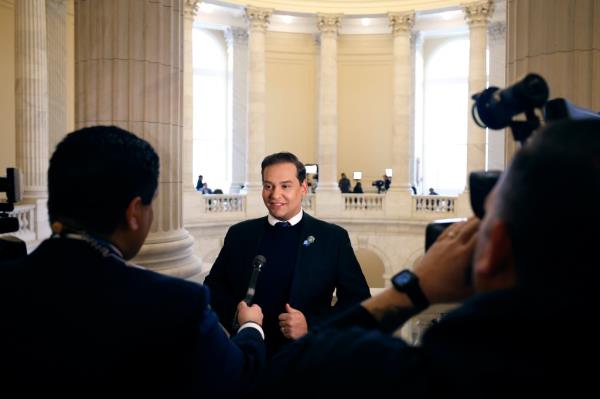 WASHINGTON, DC - DECEMBER 01: Rep. George Santos (R-NY) is interviewed by FOX News in the rotunda of the Cannon House Office Building before a vote to expel him from the House of Representatives on December 01, 2023 in Washington, DC. Charged by the U.S. Department of Justice with 23 felo<em></em>nies in New York including fraud and campaign finance violations, Santos, 35, is facing expulsion from the House of Representatives after the Ethics Committee reported that it found asubstantial evidencea that he had violated the law. If expelled, Santos would be just the sixth person in U.S. history to be expelled from the House of Representatives. (Photo by Anna Moneymaker/Getty Images)